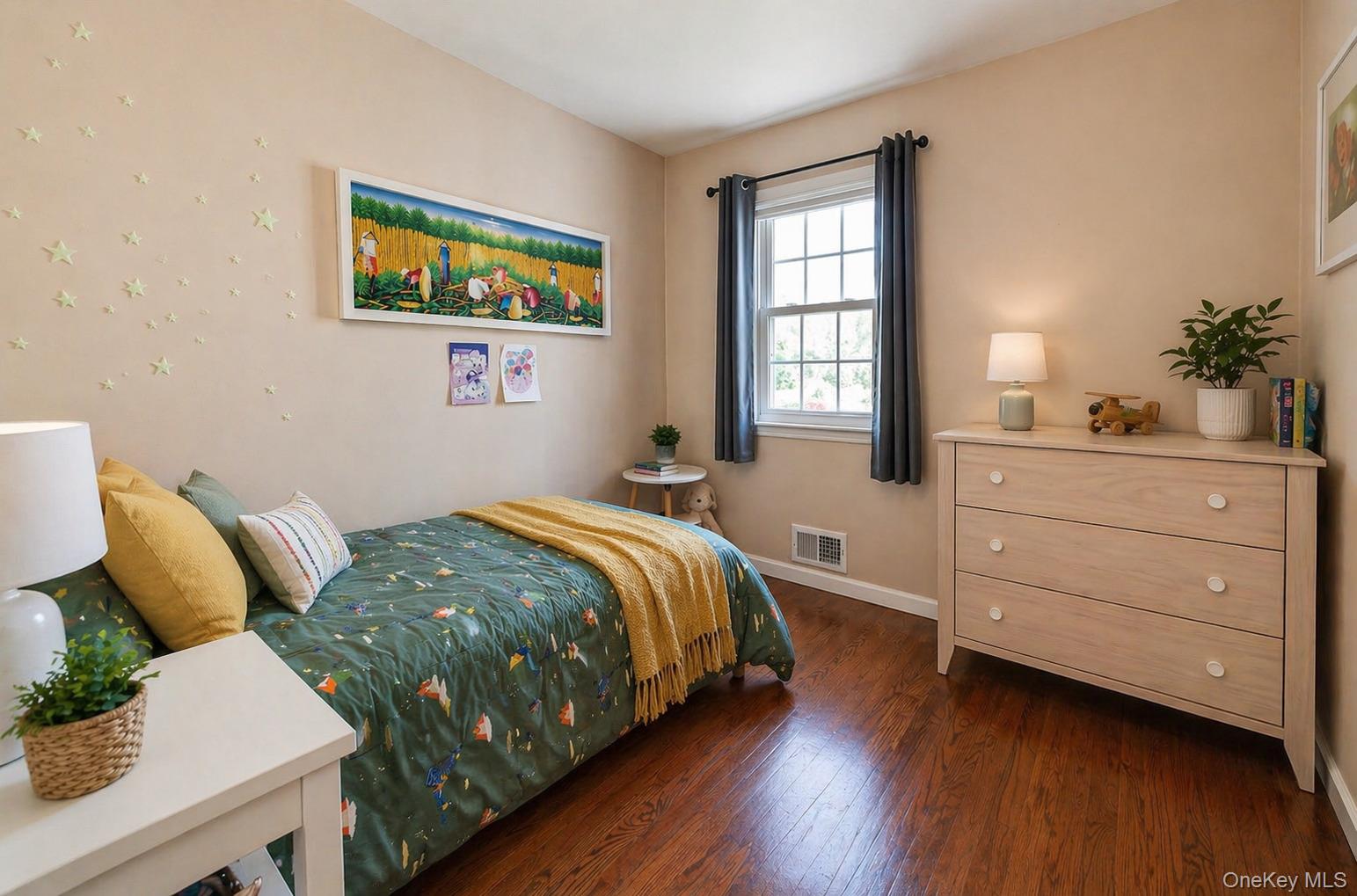 6 Huyler Road Setauket, NY 11733 - Photo 17 of 27 a bedroom with a bed and a dresser