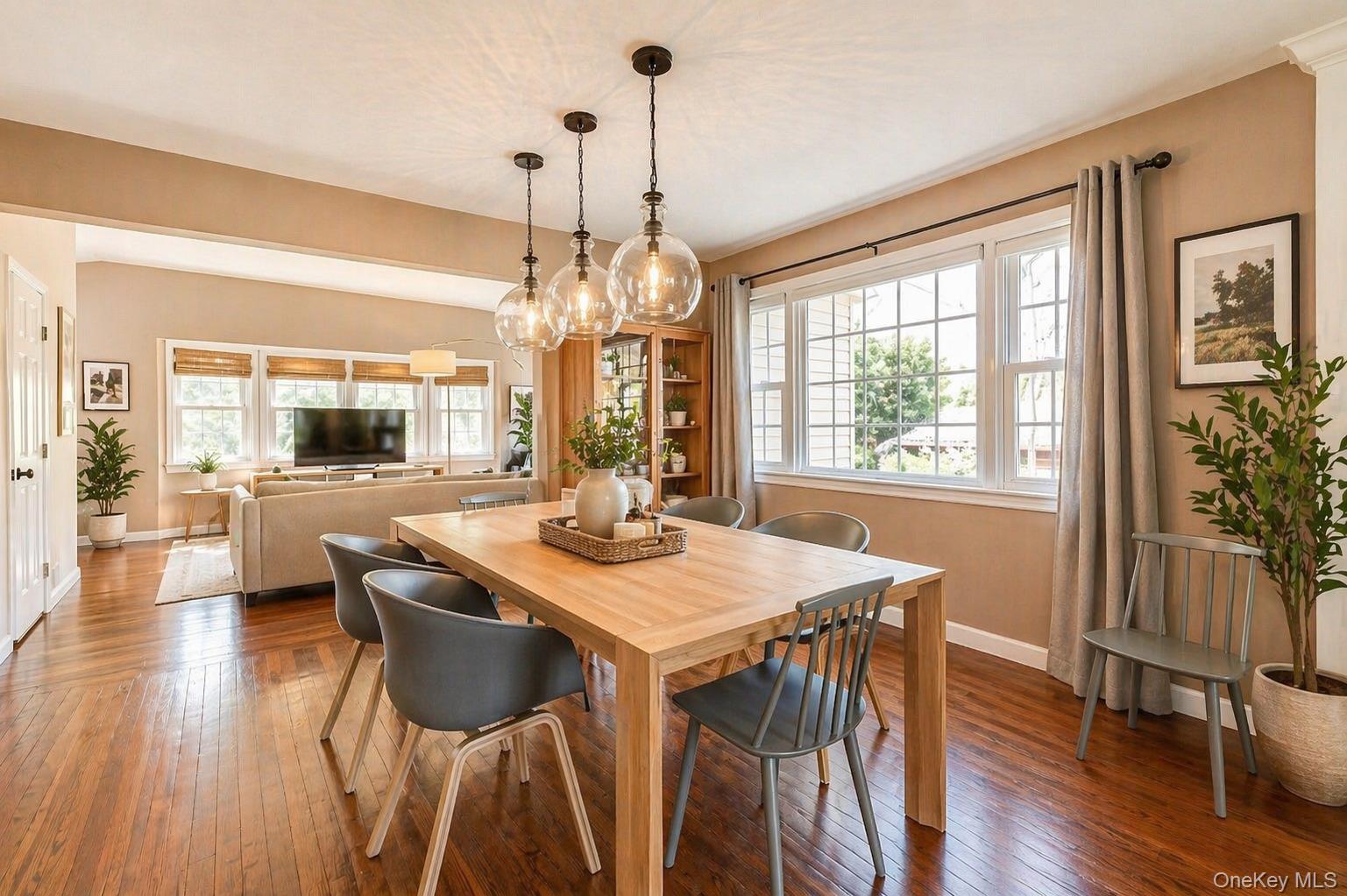 6 Huyler Road Setauket, NY 11733 - Photo 9 of 27 a view of a dining room with furniture window and wooden floor