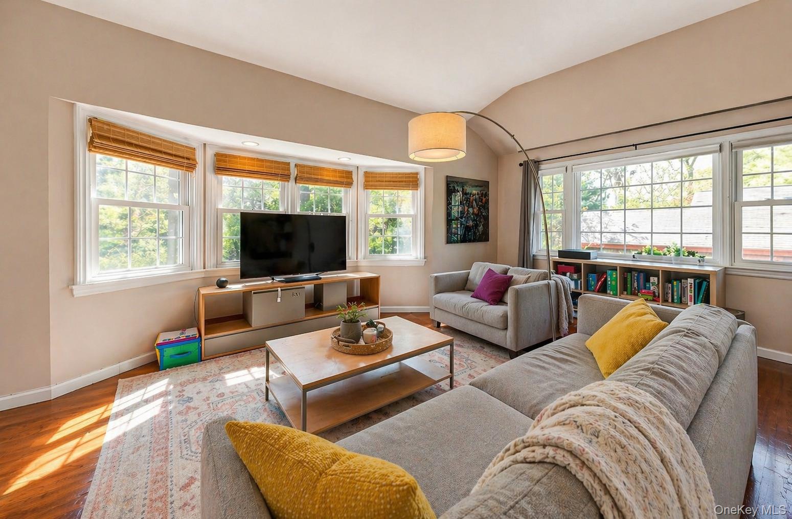 6 Huyler Road Setauket, NY 11733 - Photo 10 of 27 a living room with furniture and a large window