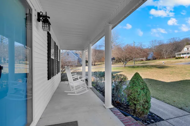 a view of a balcony with lake view