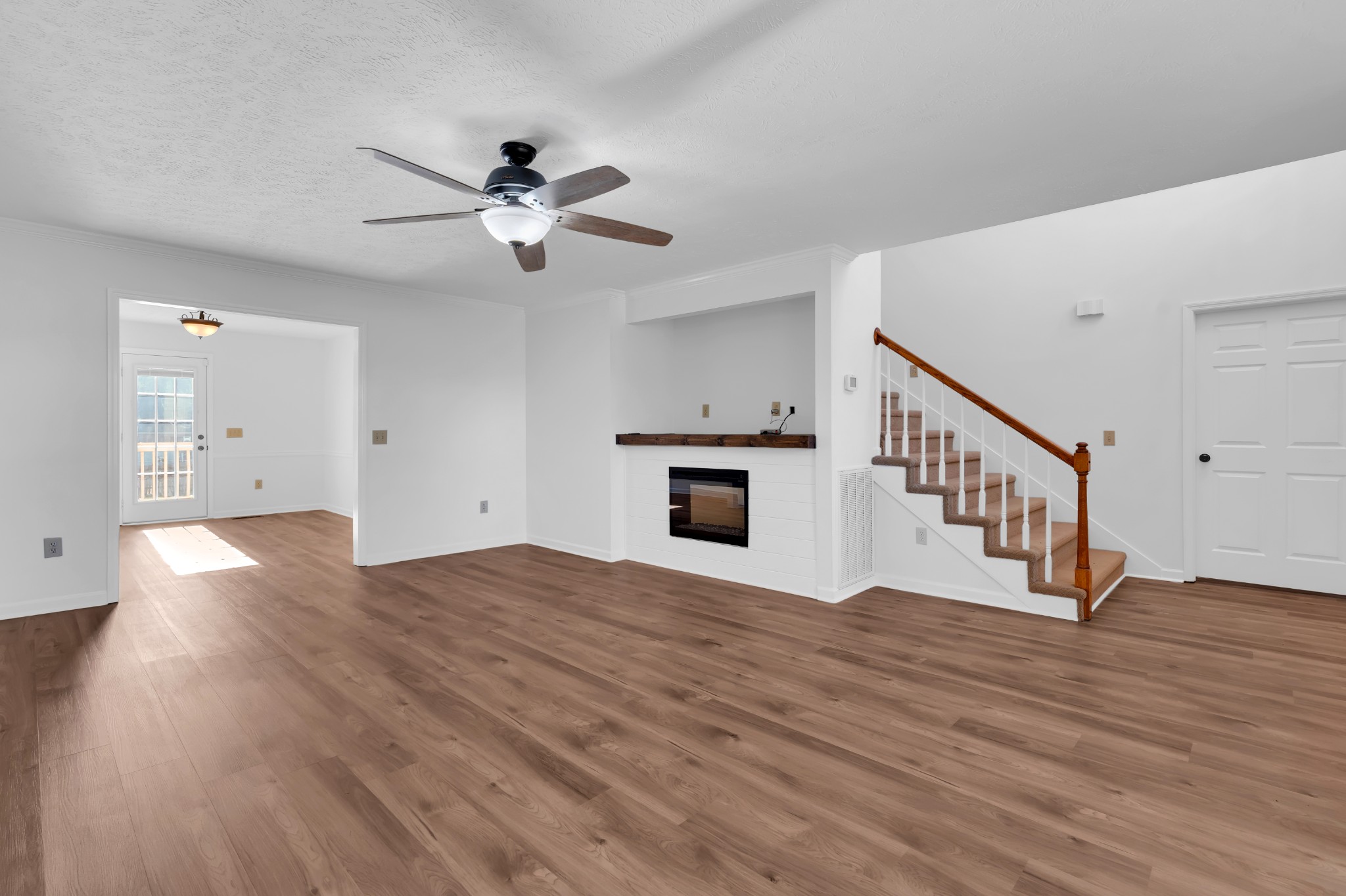113 Matt Drive Bell Buckle, TN 37020 - Photo 12 of 34 a view of empty room with wooden floor and fan