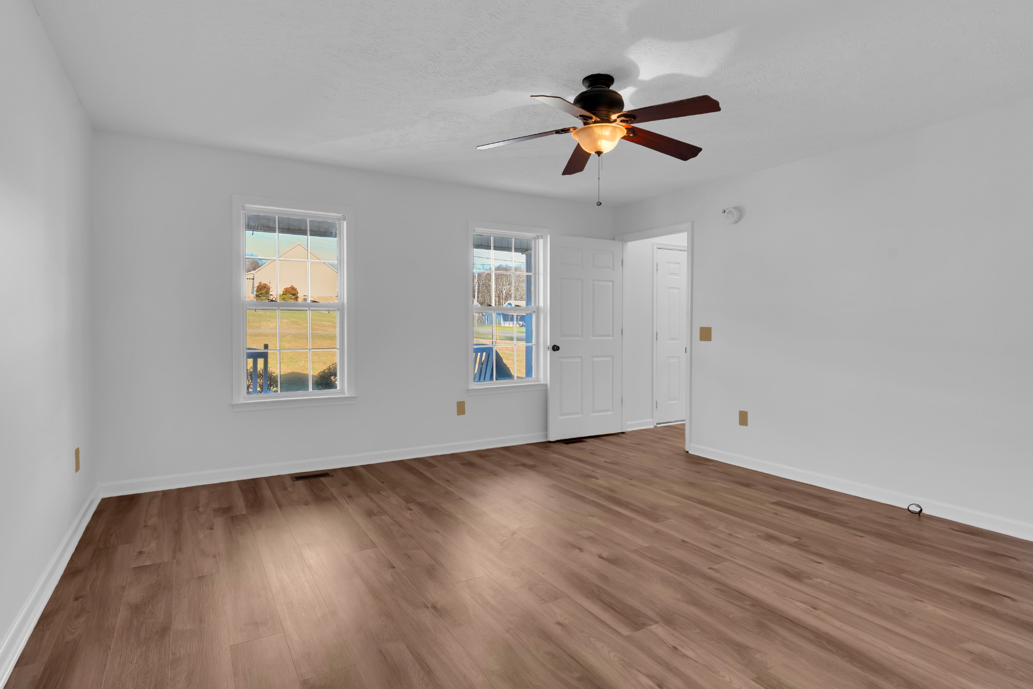 113 Matt Drive Bell Buckle, TN 37020 - Photo 22 of 34 a view of empty room with wooden floor and fan