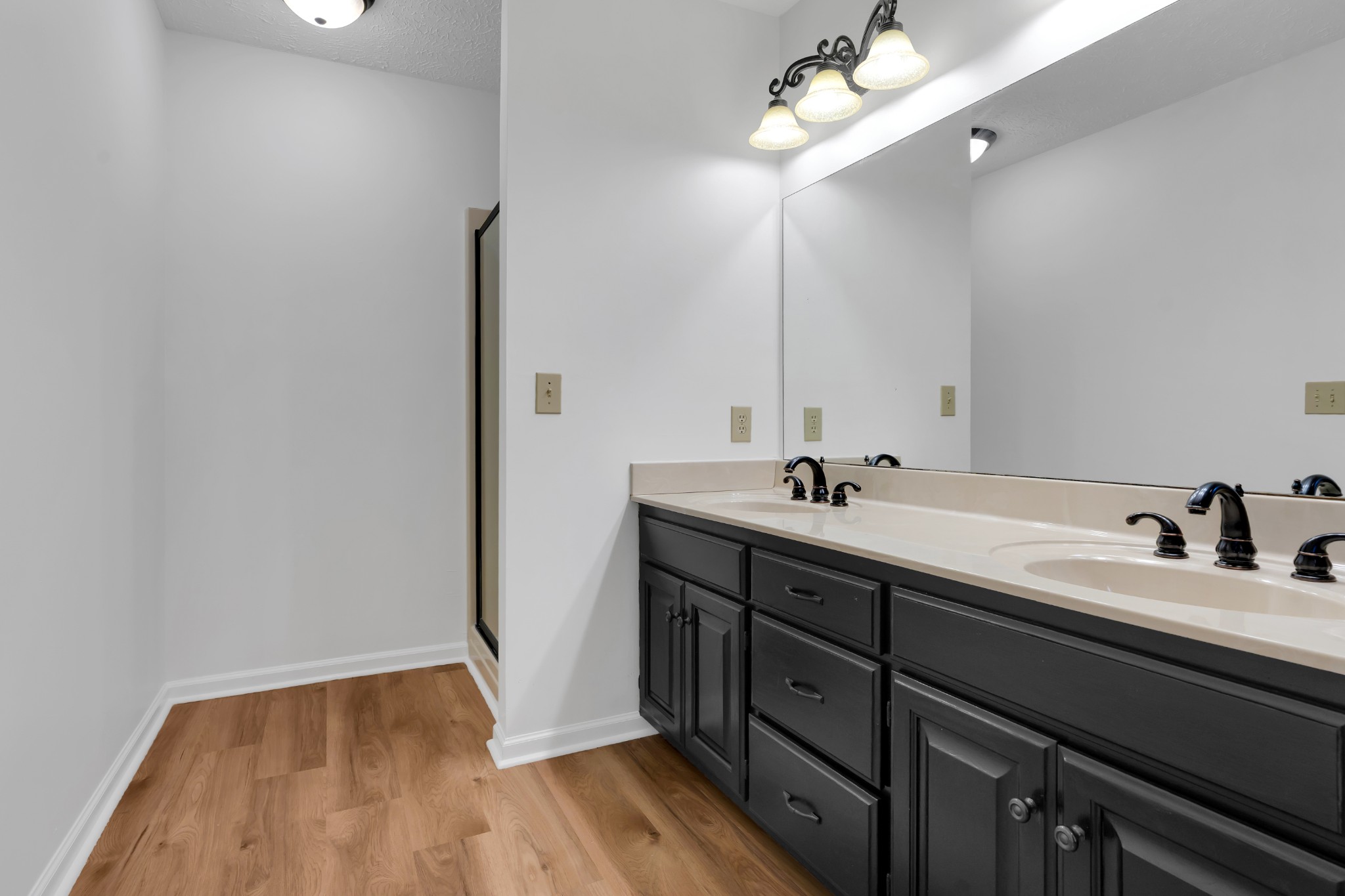 113 Matt Drive Bell Buckle, TN 37020 - Photo 23 of 34 a bathroom with a double vanity sink and a mirror