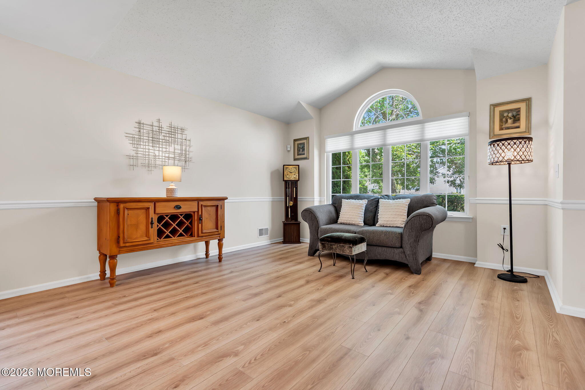 10 Congressional Road Jackson, NJ 08527 - Photo 6 of 72 a living room with furniture and a floor to ceiling window