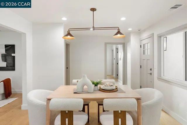 a view of a dining room with furniture