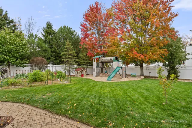 a view of a house with a yard porch and sitting area
