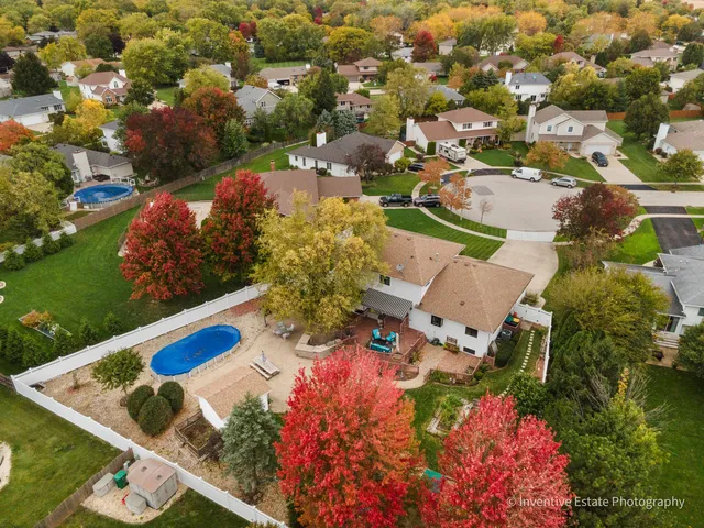 an aerial view of a house with a garden