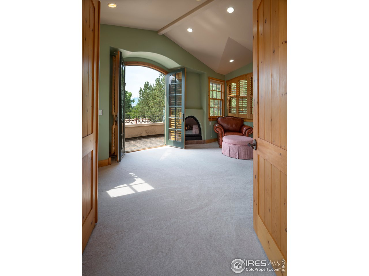 7088 Indian Peaks Trail Boulder, CO 80301 - Photo 18 of 40 Upper Master sitting w/balcony