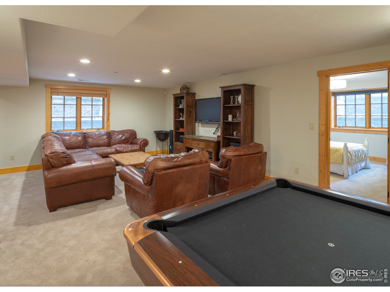 7088 Indian Peaks Trail Boulder, CO 80301 - Photo 31 of 40 Basement rec room