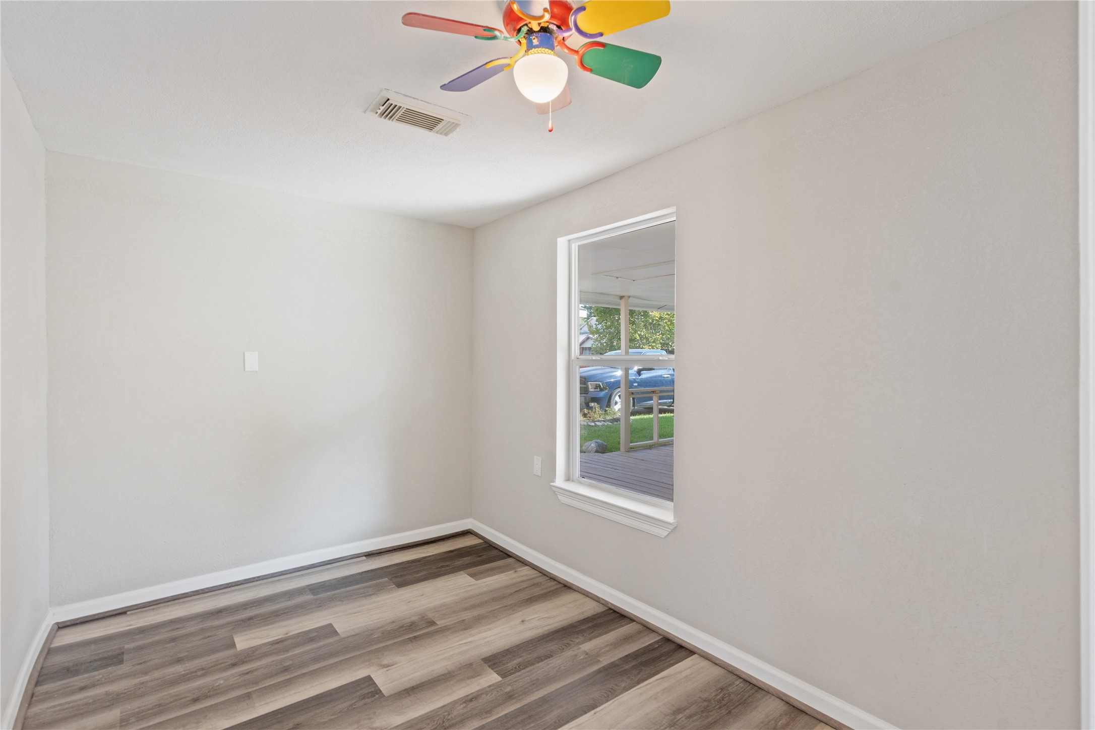 10613 Chadwick Street Houston, TX 77029 - Photo 26 of 30 a view of an empty room with a window