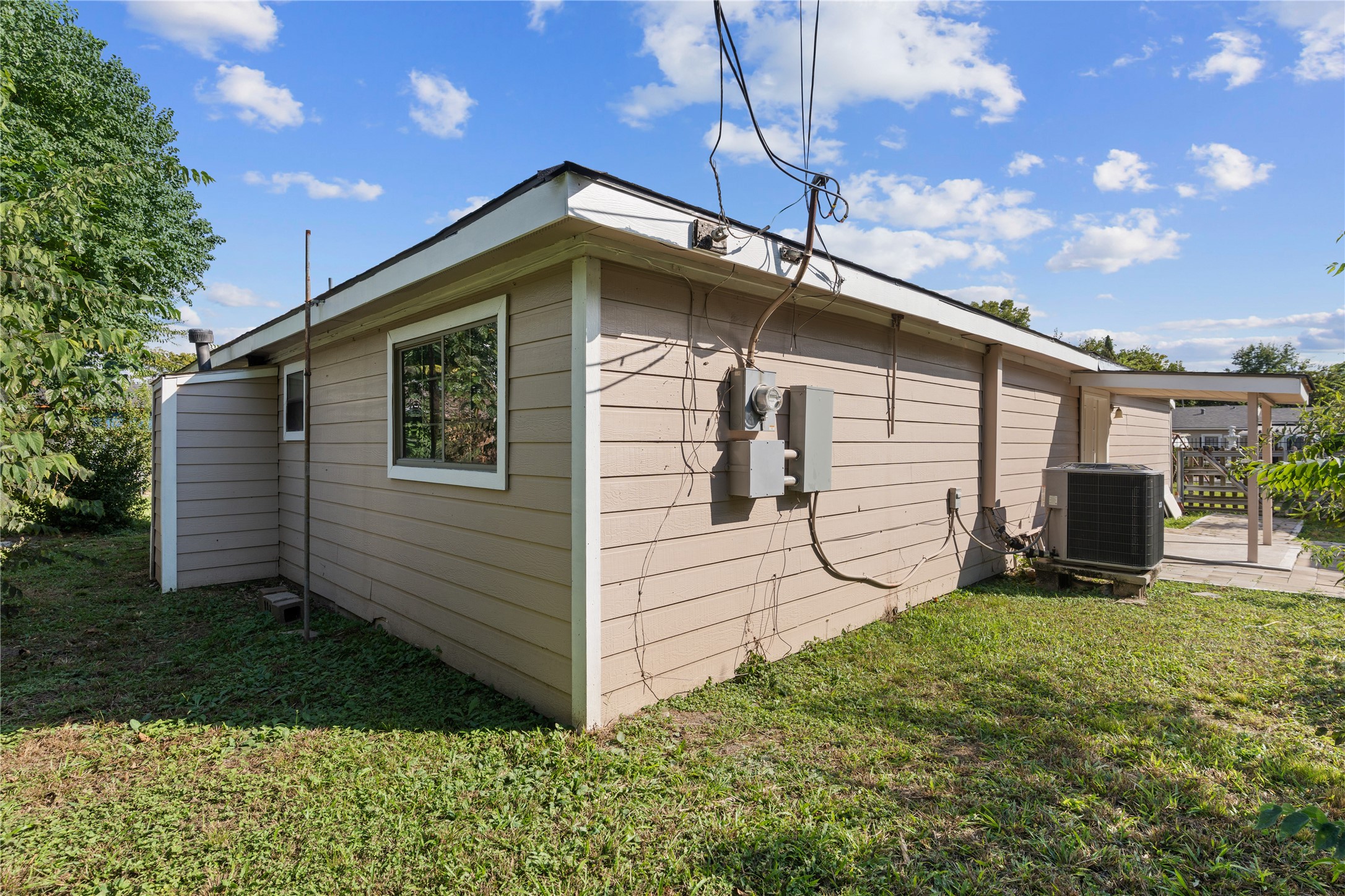 10613 Chadwick Street Houston, TX 77029 - Photo 27 of 30 a house view with a backyard space