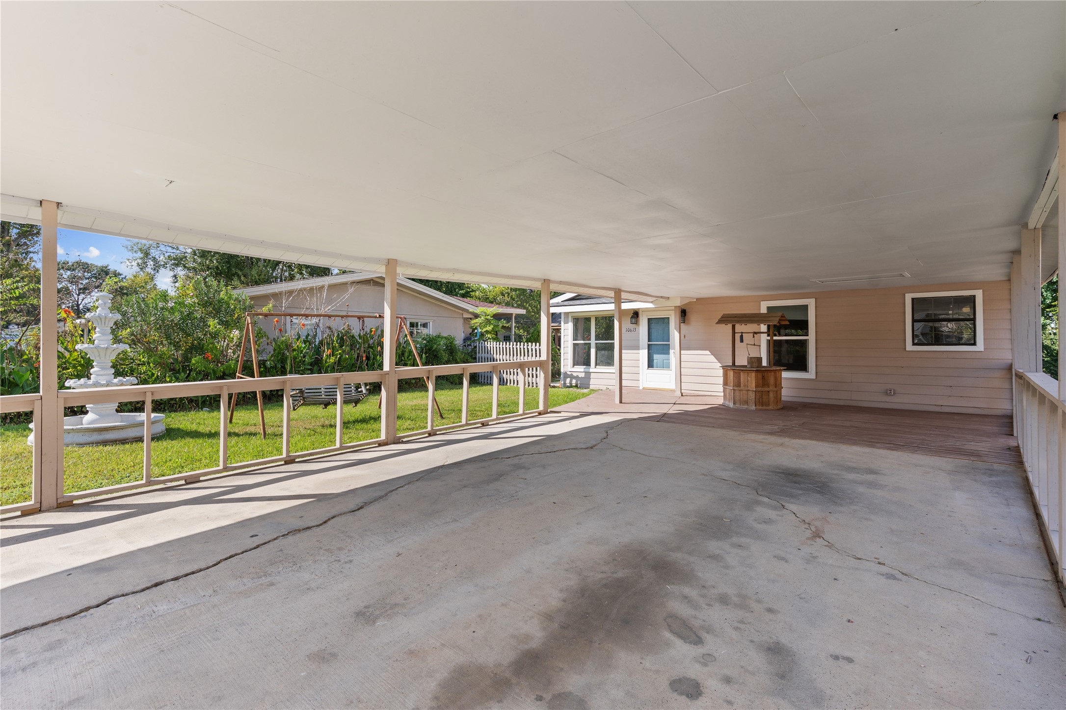 10613 Chadwick Street Houston, TX 77029 - Photo 4 of 30 a view of a house with porch and wooden floor