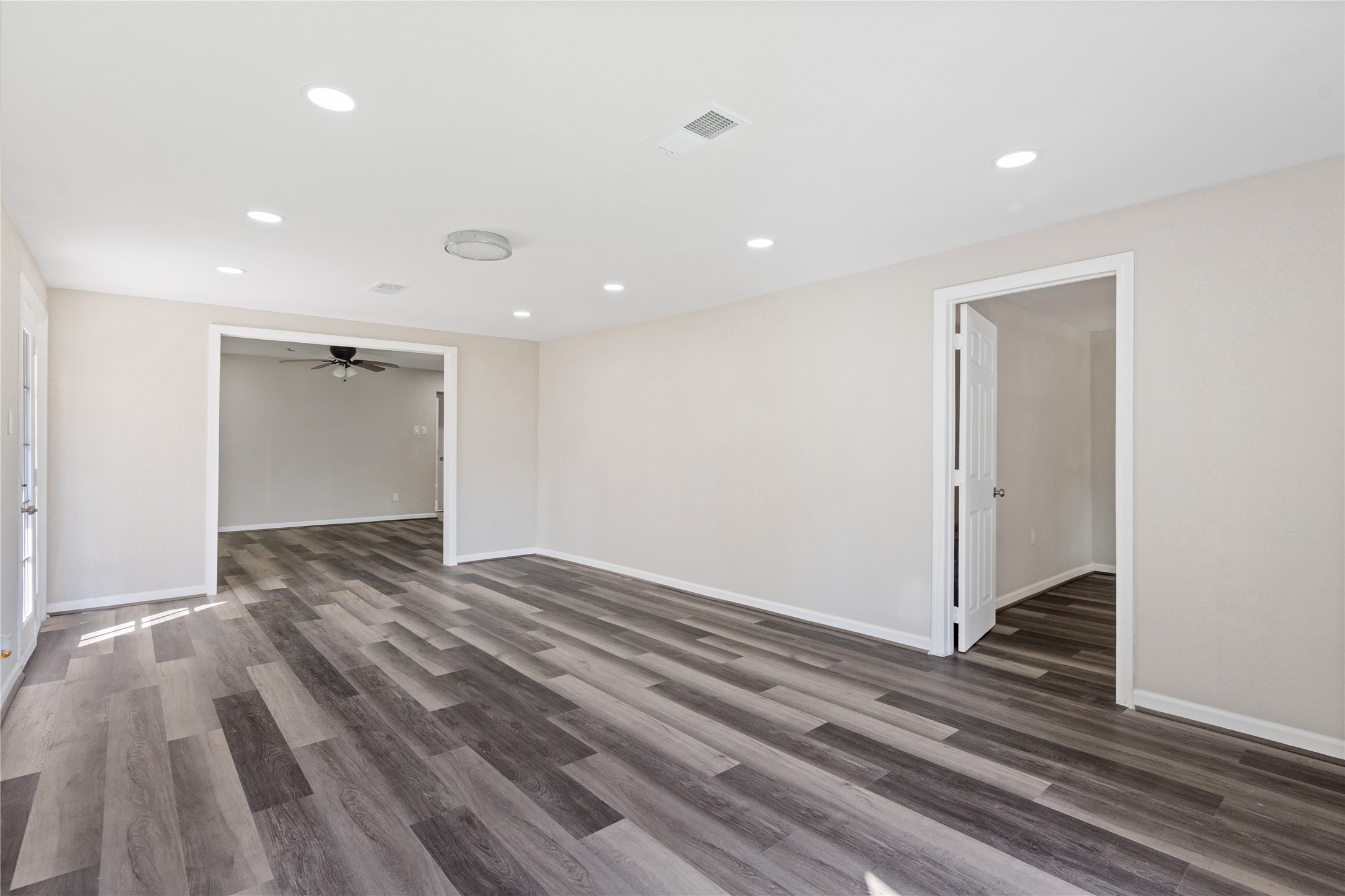 10613 Chadwick Street Houston, TX 77029 - Photo 8 of 30 a view of a room with wooden floor