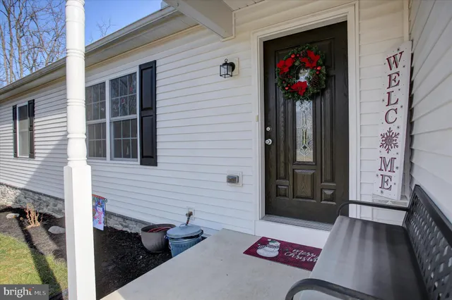 a view of a couch in front of house
