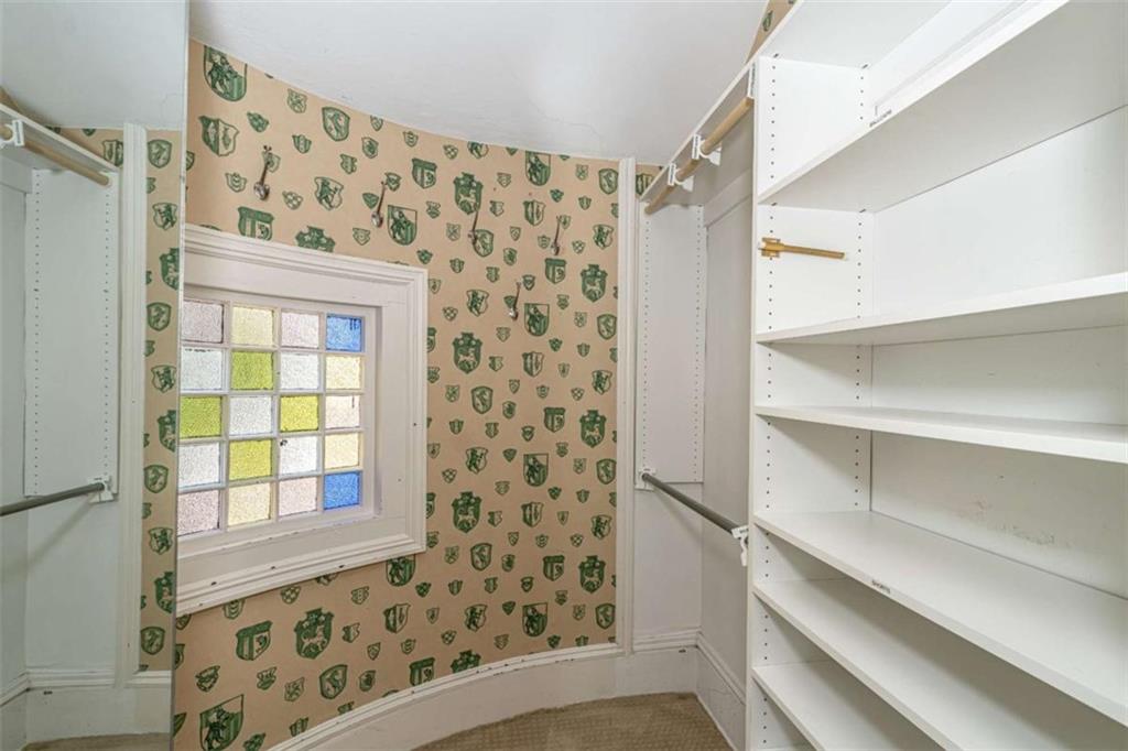 320 East 3rd Avenue Rome, GA 30161 - Photo 53 of 94 a view of walk in closet with empty racks