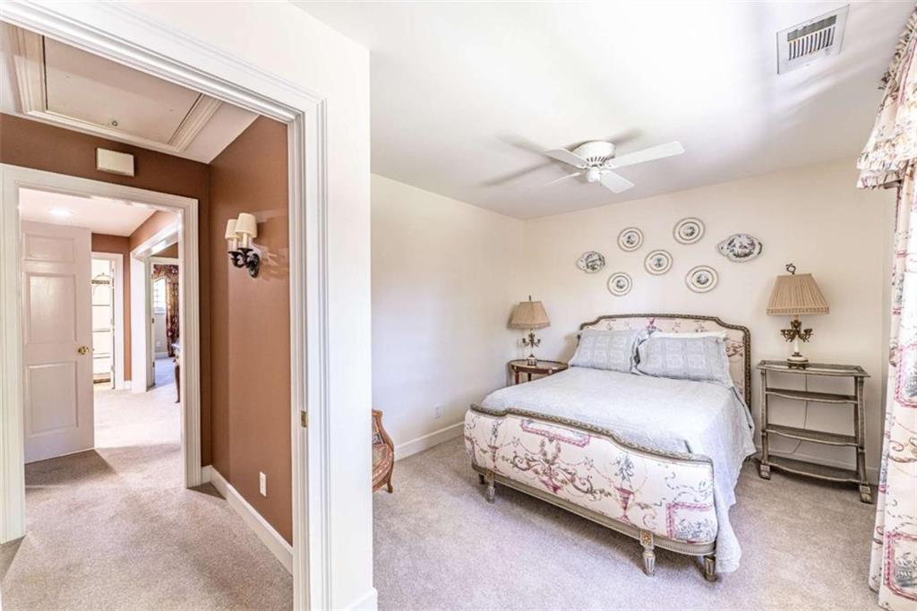 320 East 3rd Avenue Rome, GA 30161 - Photo 73 of 94 a bedroom with a bed and a ceiling fan