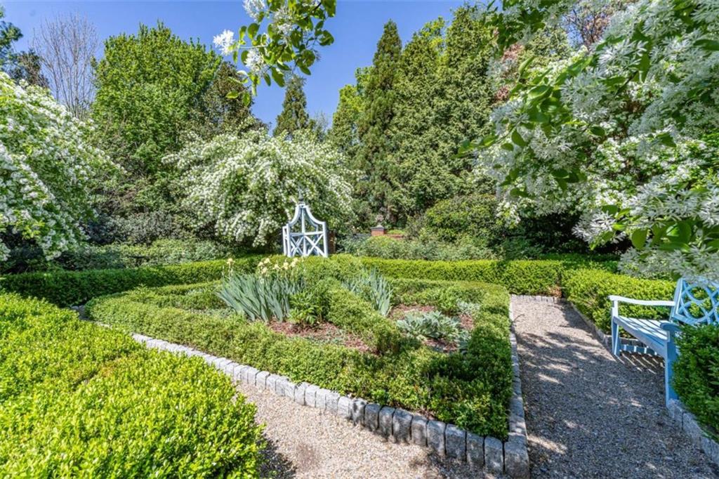 320 East 3rd Avenue Rome, GA 30161 - Photo 87 of 94 a view of a garden with a fountain
