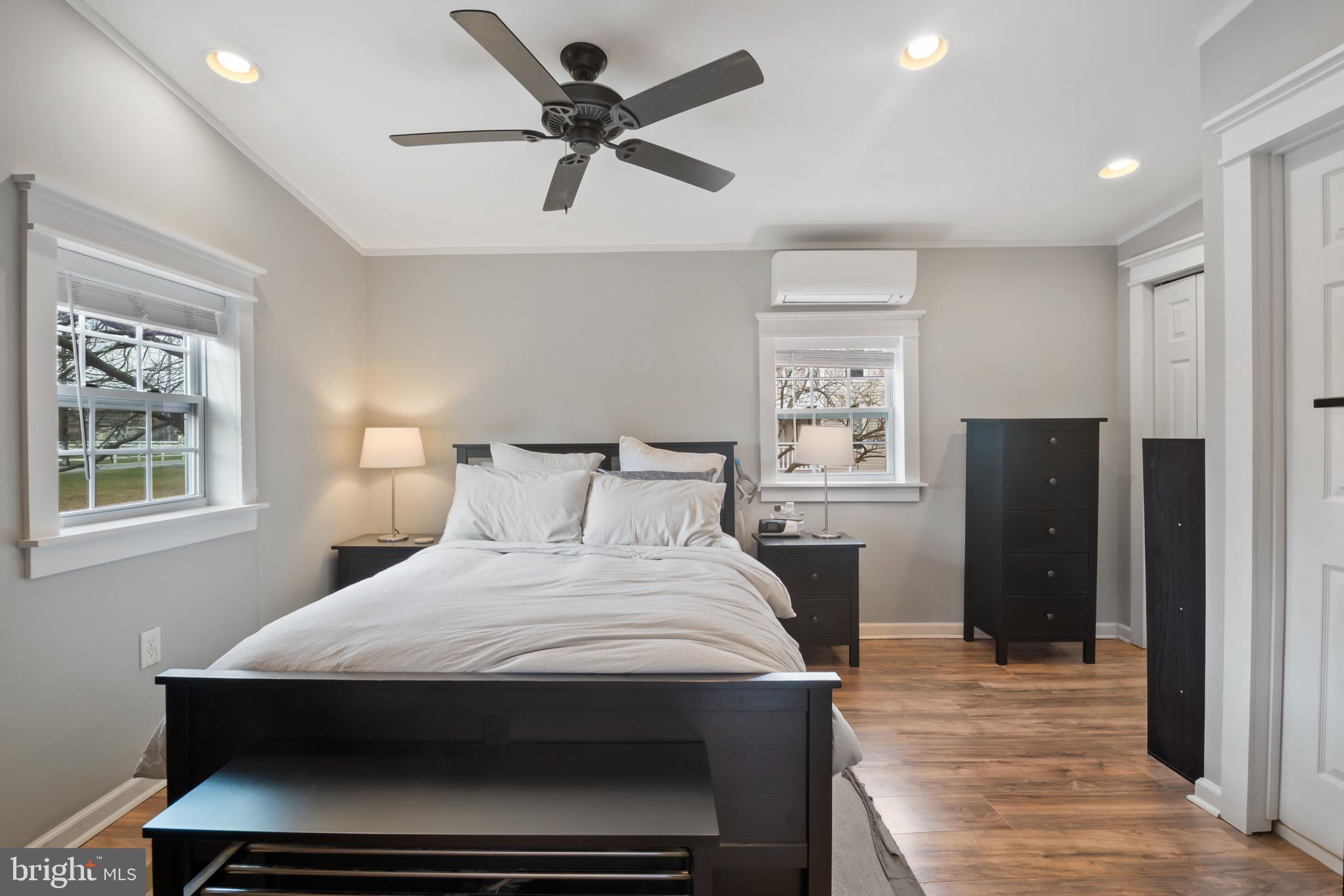 10520 Scaggsville Road Laurel, MD 20723 - Photo 12 of 32 a bedroom with a bed and a window