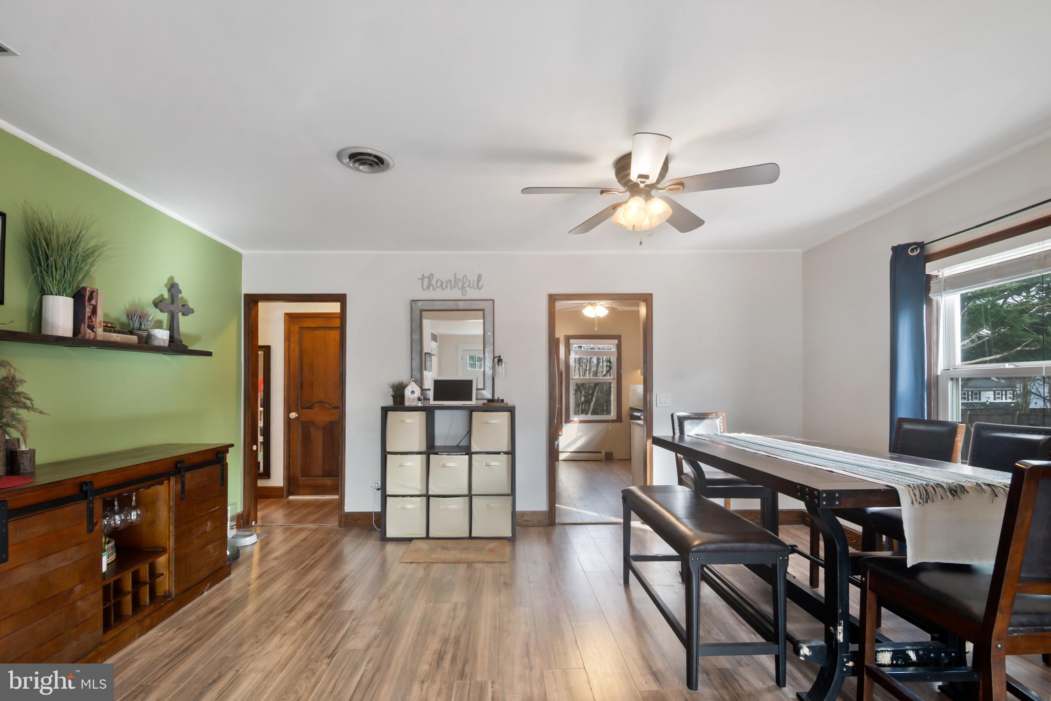 10520 Scaggsville Road Laurel, MD 20723 - Photo 7 of 32 a view of a livingroom with furniture and a flat screen tv