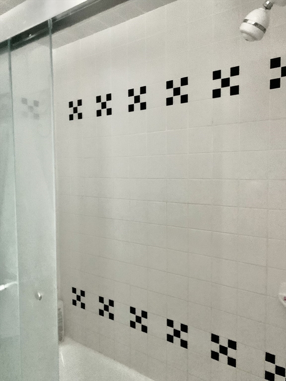 16 Evans Road Needham, MA 02492 - Photo 17 of 23 a bathroom with white shower