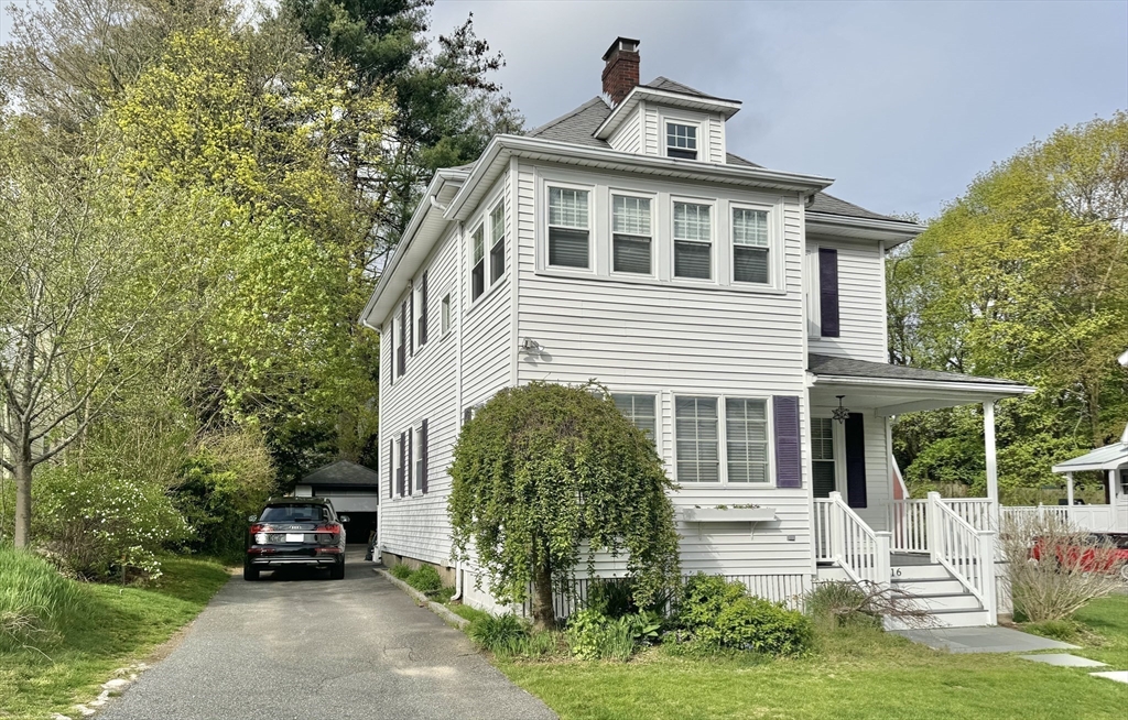 16 Evans Road Needham, MA 02492 - Photo 20 of 23 a front view of a house with a yard