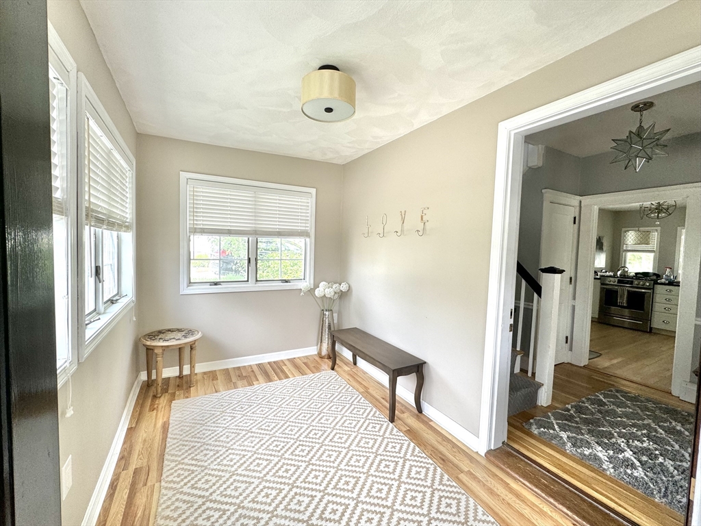 16 Evans Road Needham, MA 02492 - Photo 3 of 23 a bedroom with a bed and a window