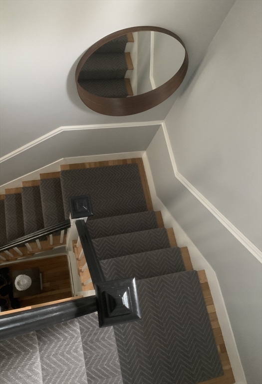 16 Evans Road Needham, MA 02492 - Photo 10 of 23 a utility room with wooden floor and windows