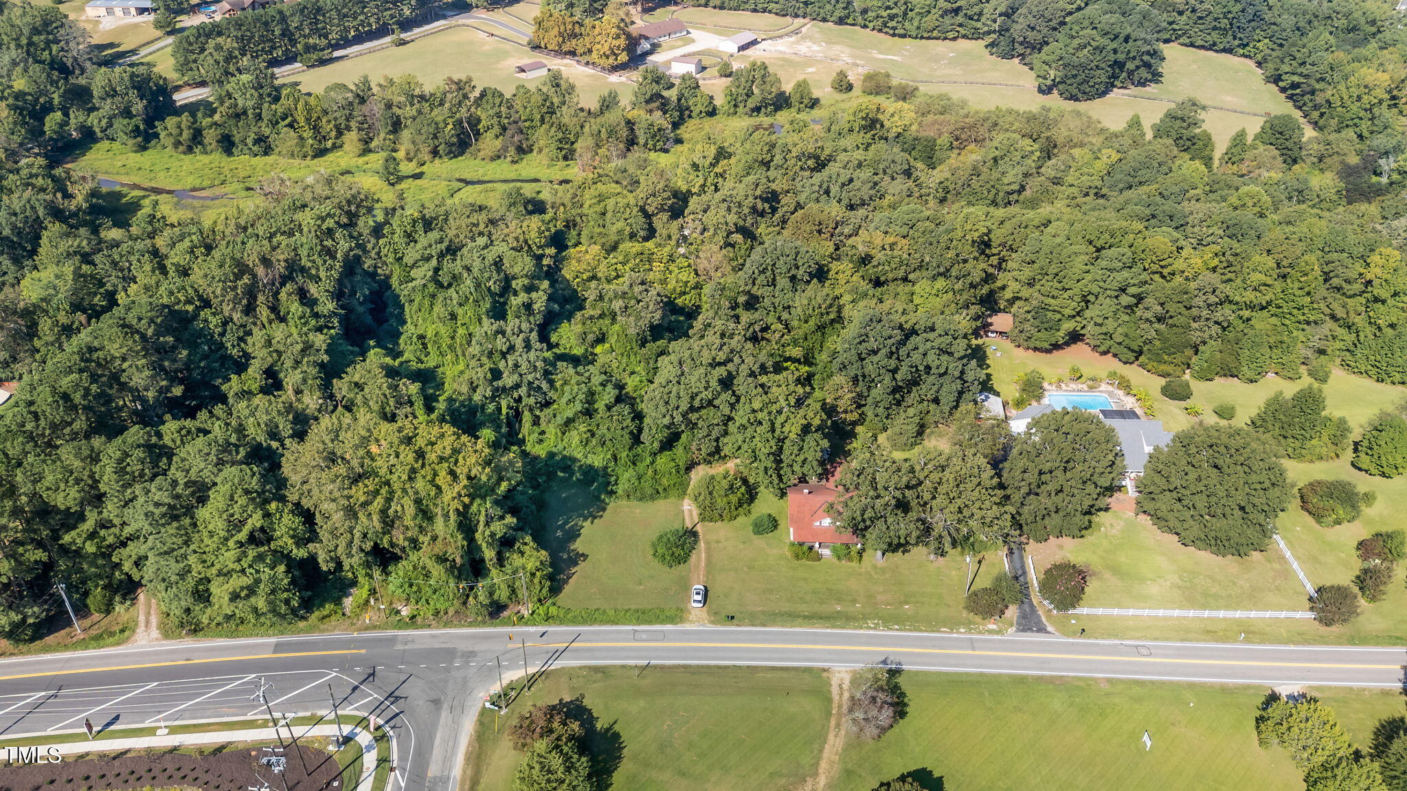 4316 Forestville Road Raleigh, NC 27616 - Photo 5 of 13 9-web-or-mls-DJI_20250905101050_0144_D