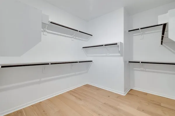 a view of an empty walk in closet