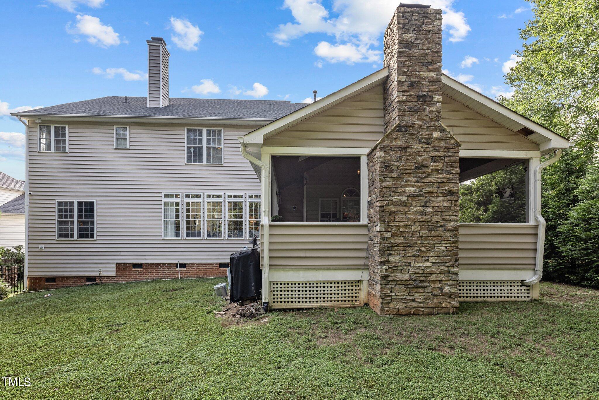 12404 Village Gate Way Raleigh, NC 27614 - Photo 43 of 53 Back elevation - Stone chimney