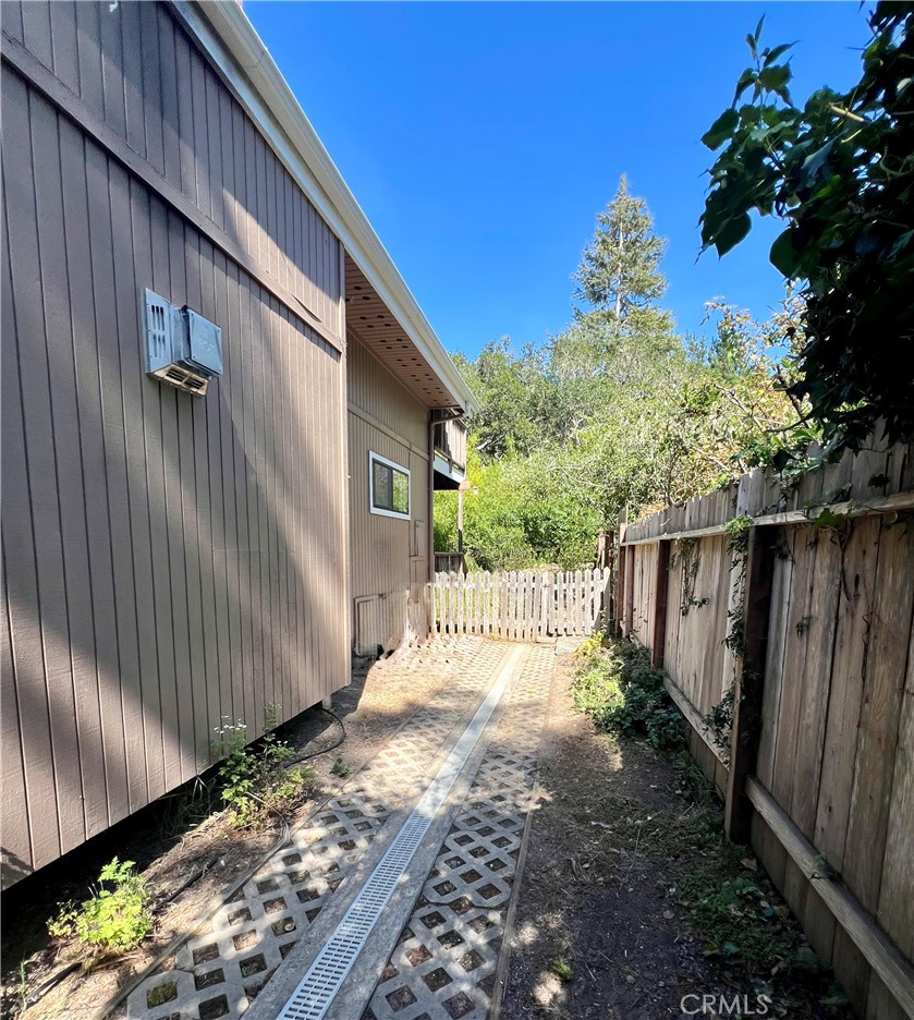 1530 Emerson Road Cambria, CA 93428 - Photo 44 of 54 West side of house towards the back yard