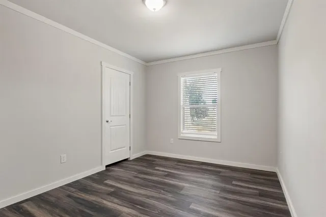 a view of a backyard of a house