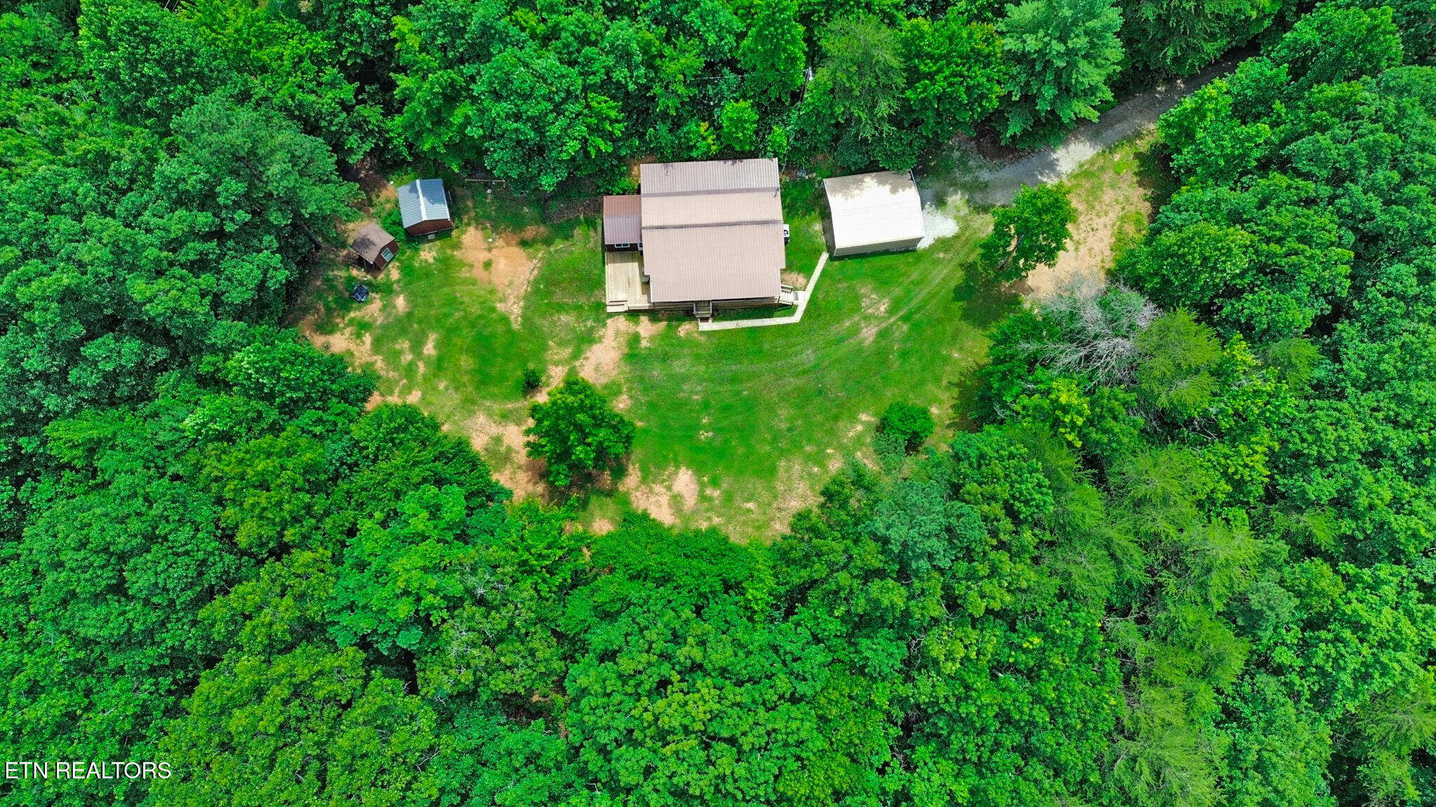 615 East Robbins Road Robbins, TN 37852 - Photo 5 of 44 dji_0219-dji_0221