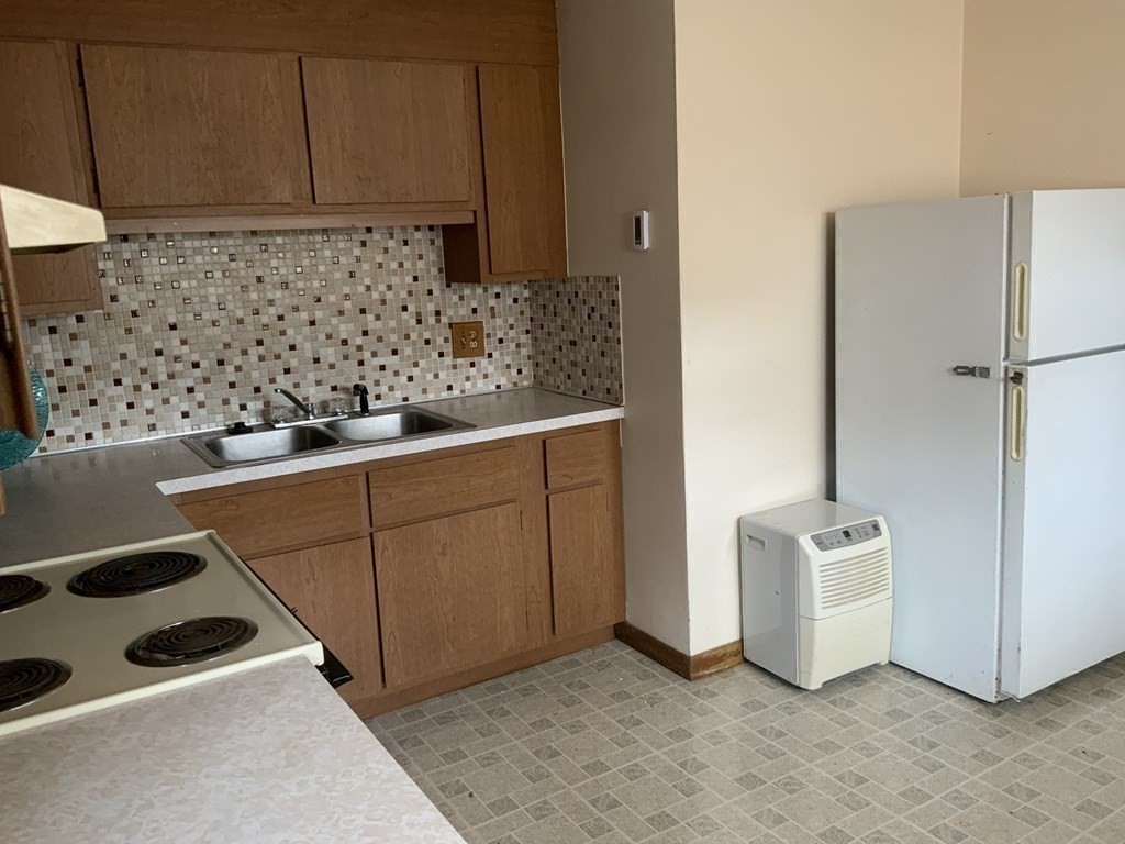 44-46 Catalina Road Lynn, MA 01905 - Photo 13 of 28 a view of cabinets and window