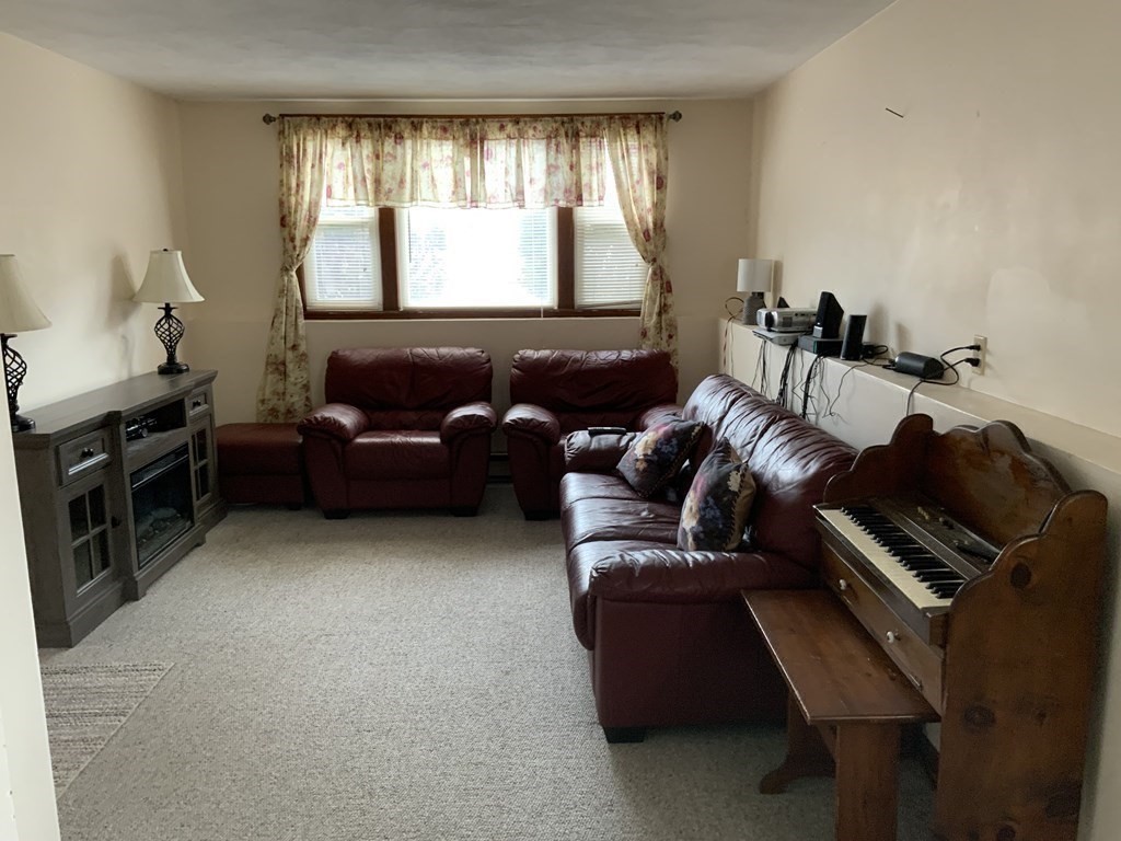 44-46 Catalina Road Lynn, MA 01905 - Photo 14 of 28 a living room with furniture and a window