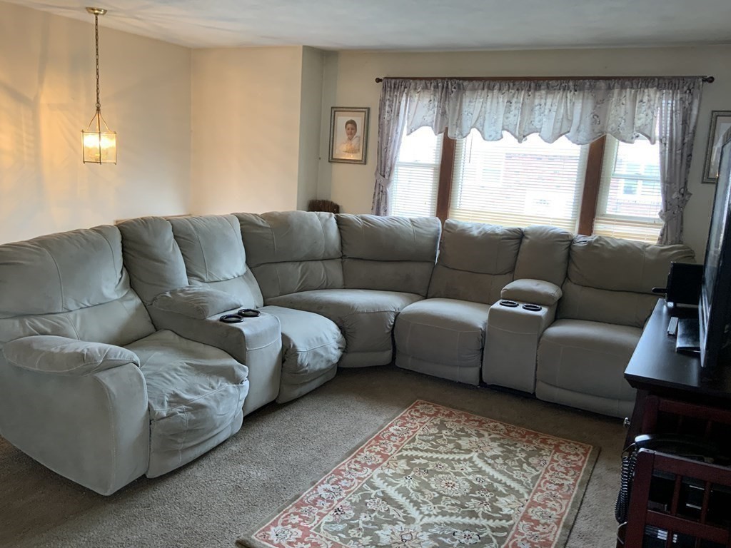 44-46 Catalina Road Lynn, MA 01905 - Photo 23 of 28 a living room with furniture and a rug