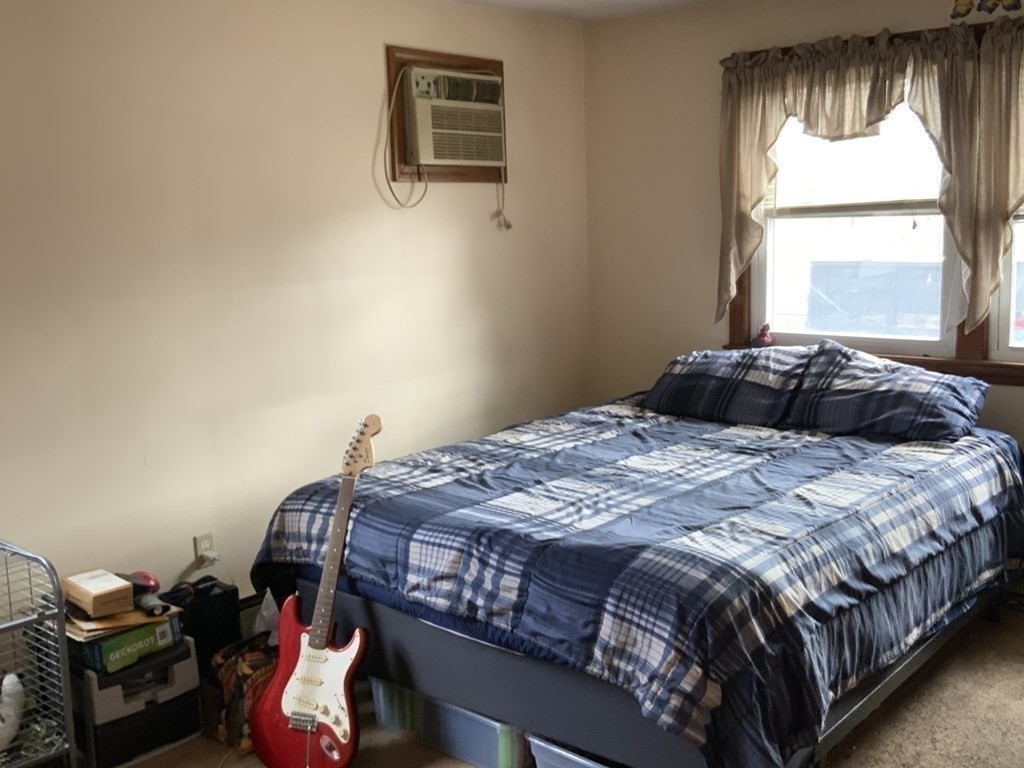 44-46 Catalina Road Lynn, MA 01905 - Photo 25 of 28 a bedroom with a bed and a window