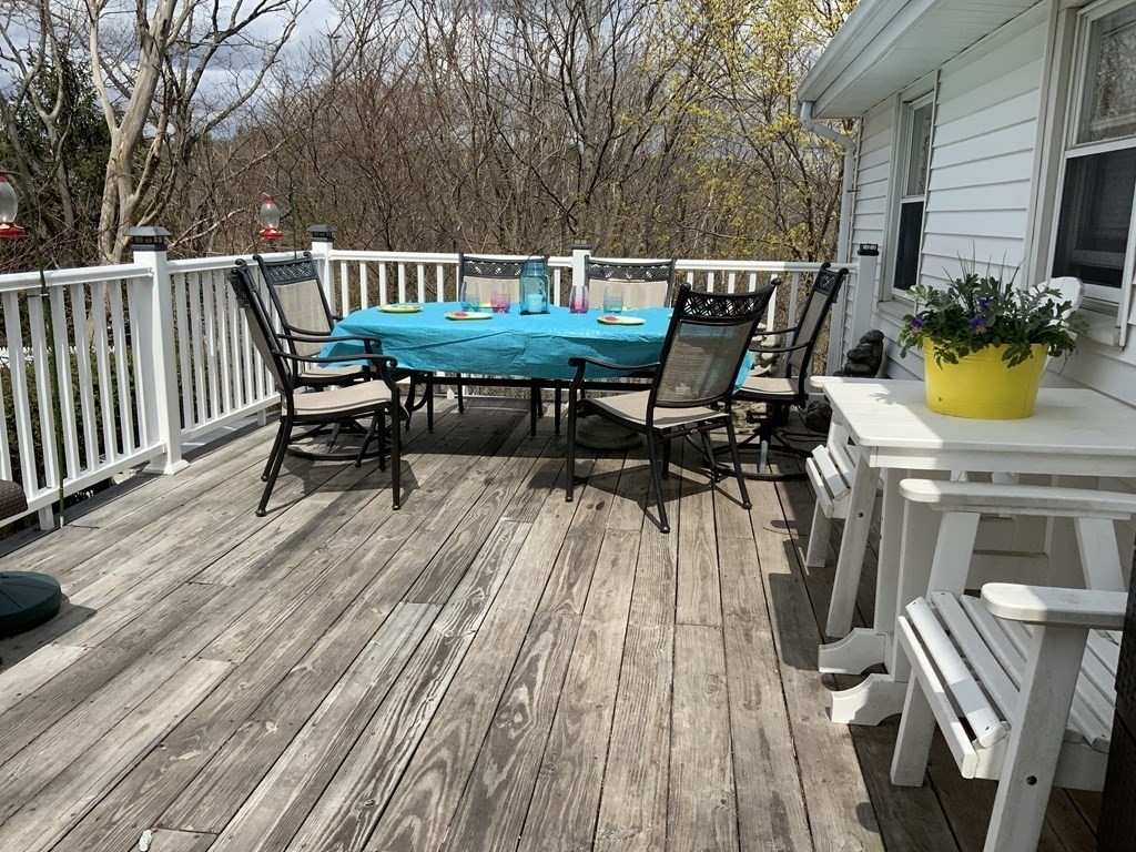 44-46 Catalina Road Lynn, MA 01905 - Photo 3 of 28 a view of balcony with chairs and wooden floor