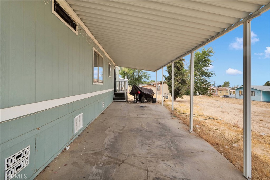 2494 Main Street, Unit 112 Barstow, CA 92311 - Photo 19 of 20 a view of a porch with furniture