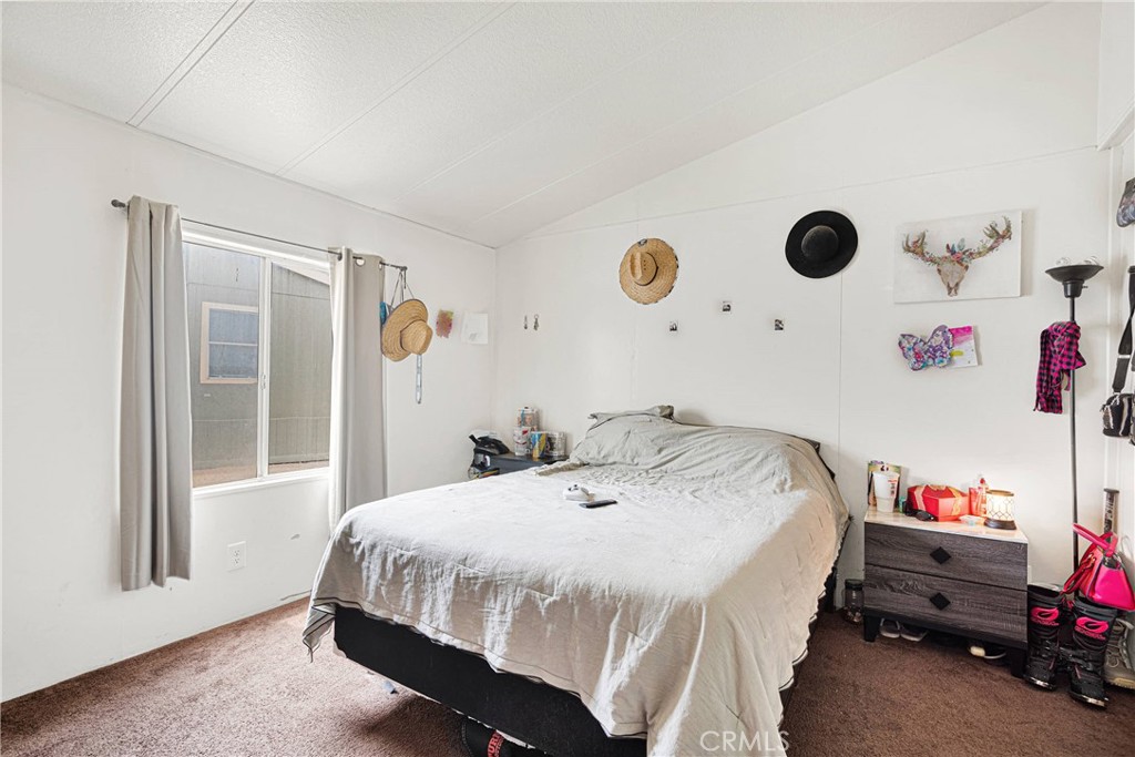 2494 Main Street, Unit 112 Barstow, CA 92311 - Photo 10 of 20 a bedroom with a bed and a window