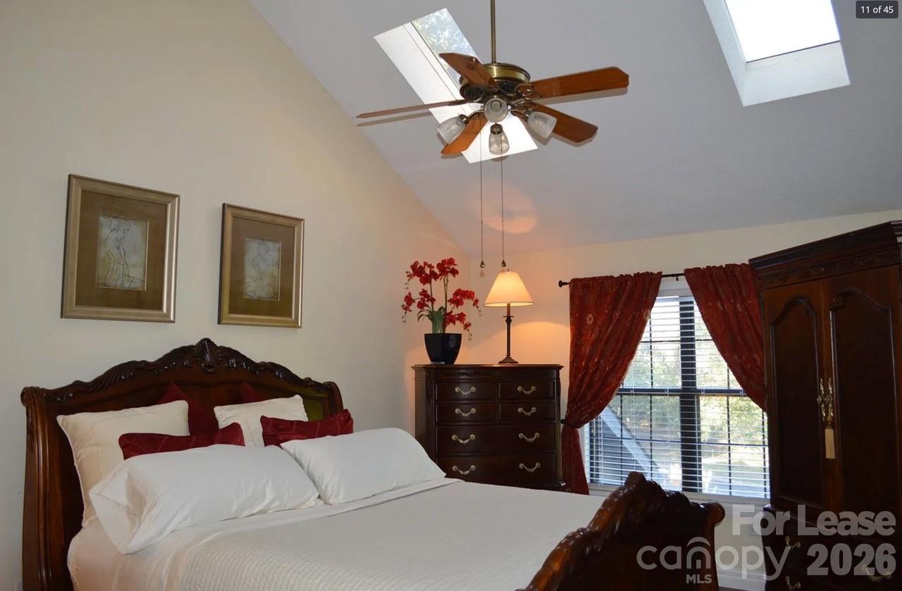 4167 Greenview Court Fort Mill, SC 29708 - Photo 7 of 16 a bedroom with a bed and a window