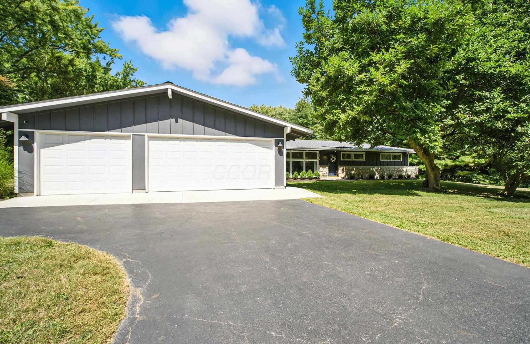 3216 Polley Road Columbus, OH 43221 - Photo 4 of 45 Oversized driveway offers the space needed to spread out.
