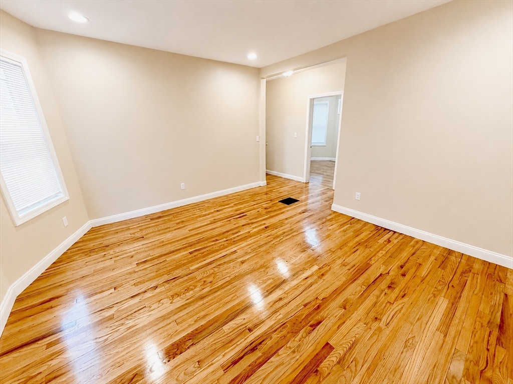 19 Dunlap Street, Unit 1 Boston, MA 02124 - Photo 5 of 9 a view of an empty room