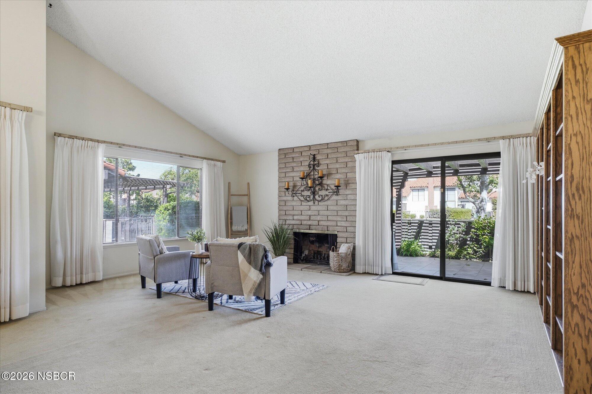 166 Tallyho Road Santa Maria, CA 93455 - Photo 4 of 20 a living room with furniture and a fireplace