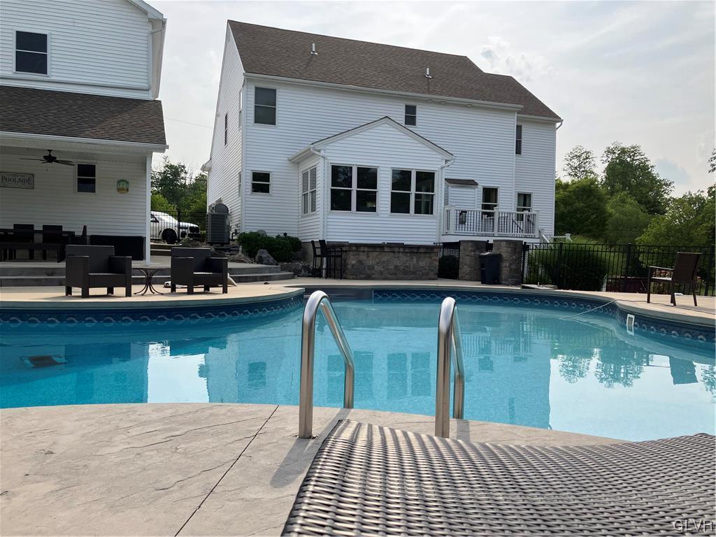 1240 Miller Road Wind Gap, PA 18091 - Photo 11 of 48 a front view of a house with swimming pool