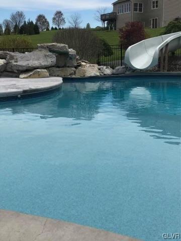 1240 Miller Road Wind Gap, PA 18091 - Photo 12 of 48 a view of a lake with couches chairs
