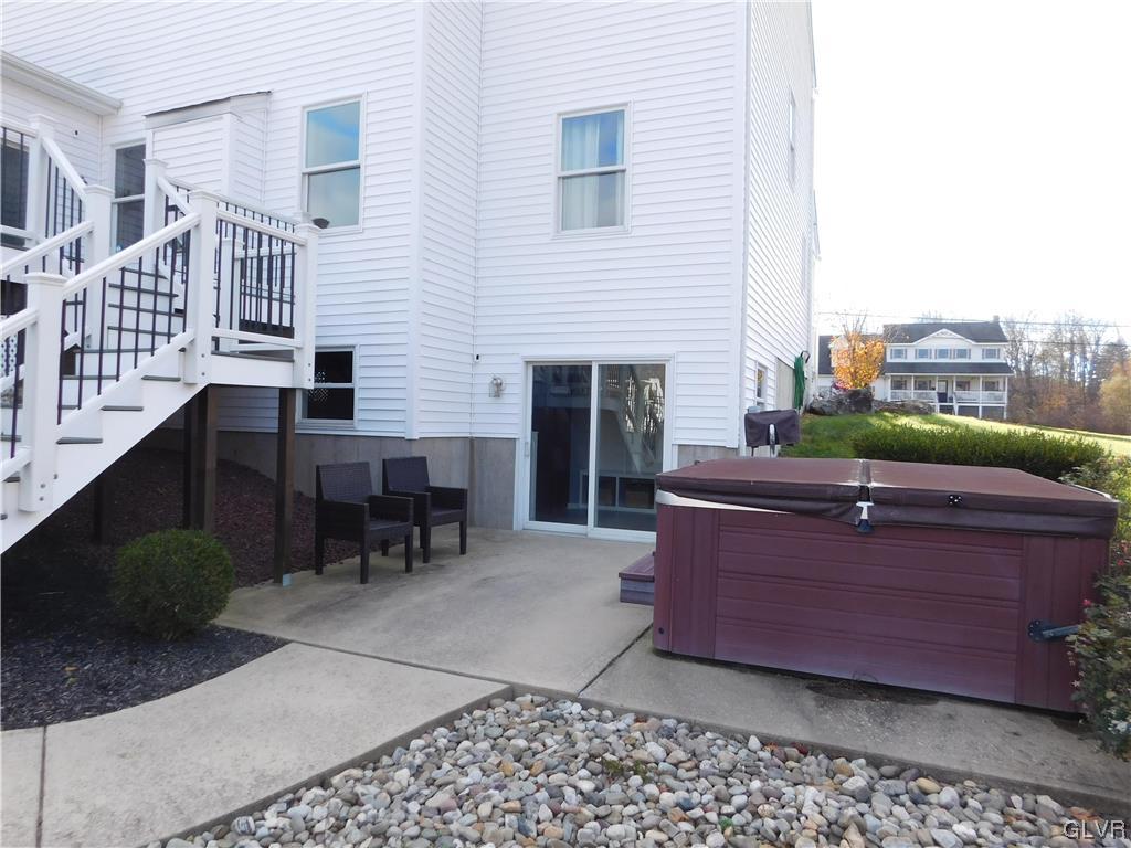 1240 Miller Road Wind Gap, PA 18091 - Photo 14 of 48 a view of a patio with a table and chairs
