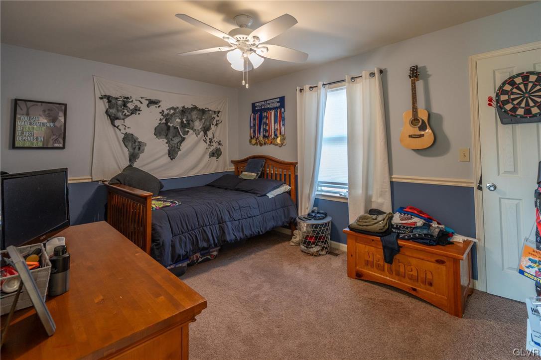 1240 Miller Road Wind Gap, PA 18091 - Photo 37 of 48 a bedroom with bed and a window