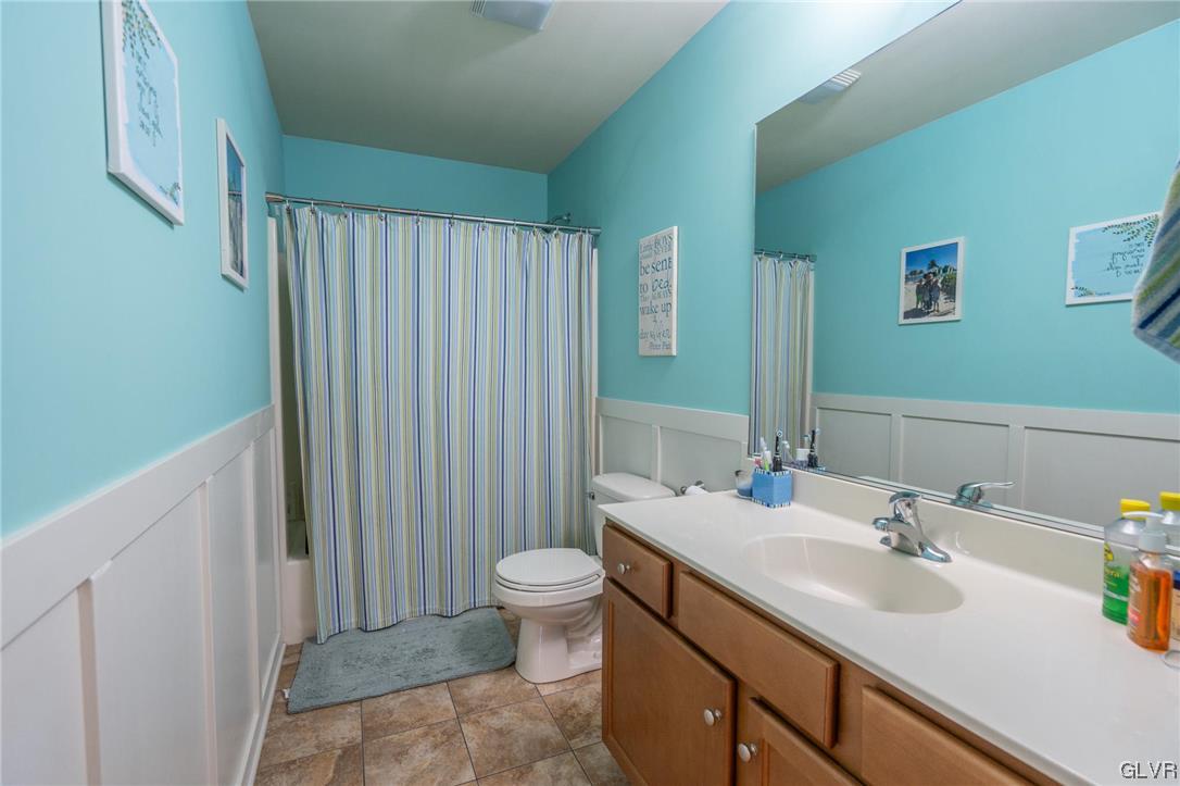 1240 Miller Road Wind Gap, PA 18091 - Photo 41 of 48 a bathroom with a sink and a mirror