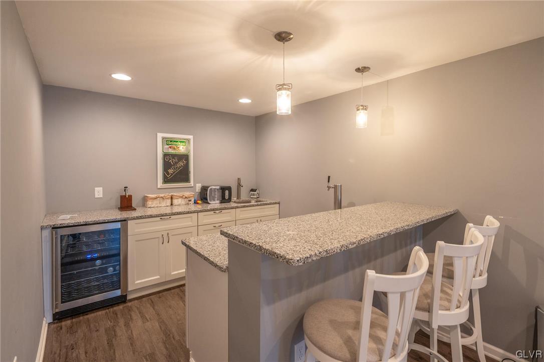 1240 Miller Road Wind Gap, PA 18091 - Photo 44 of 48 a kitchen with a table chairs sink and cabinets